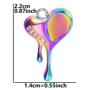 Detail of melting heart pendant with rainbow gradient and DREAM engraving, 2.2cm height