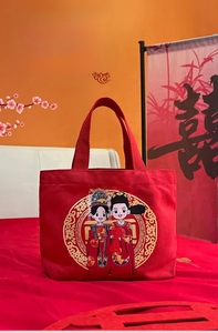 Detail of red wedding canvas tote bag featuring traditional Chinese cartoon bridal pattern