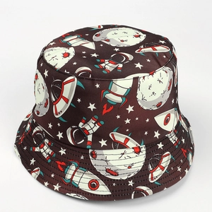 Detail of space-themed bucket hat showing astronaut prints and reinforced stitching