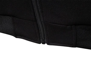Close-up of the black waffle texture fabric and premium zipper on the stand collar jacket
