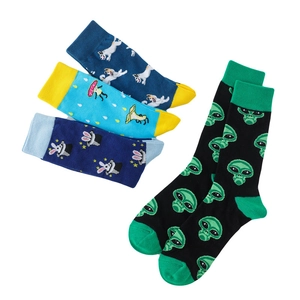 Flat lay of cotton crew socks featuring colorful alien, dog, and animal pattern prints