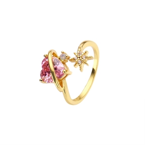 Adjustable gold plated ring featuring a pink heart zircon and sparkling star motif