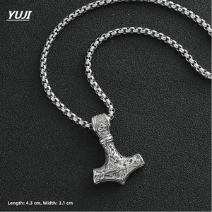 Detail view of Thor's Hammer Mjölnir pendant with runes, sized 4.3cm by 3.1cm