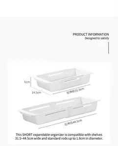 Adjustable white sink organizer showing extension range from 31.5cm up to 44.5cm length