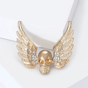 Golden alloy skull brooch with crystal-inlaid wings, punk fashion accessory for men and women