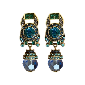 Vintage gold clip-on earrings with green and blue crystals on white background