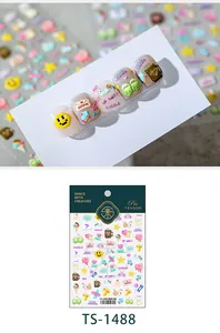 Macro detail of 3D embossed pixel art nail stickers featuring unicorns and smiley faces
