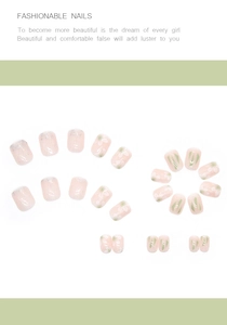 Close-up of false nails set featuring camellia flowers and green geometric patterns