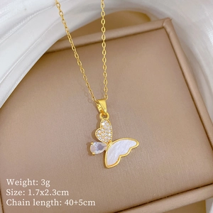 Detailed view of titanium steel shell butterfly pendant with cubic zirconia in a jewelry box