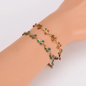 Retro bohemian gold bracelets with colorful cherry gems and green enamel leaves
