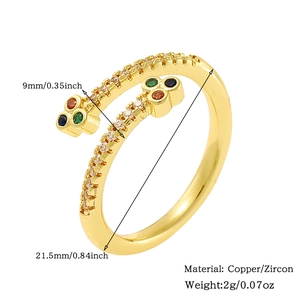 Macro detail of 18K gold plated copper ring with inlaid colorful zircon gemstones