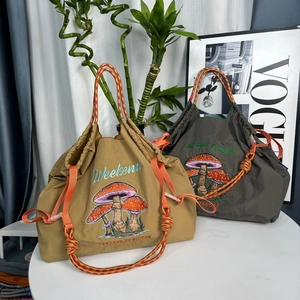 Minimalist mushroom embroidery nylon tote bag with drawstring and woven handles