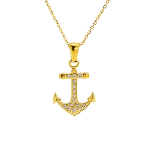 Macro detail of 18K gold plated anchor pendant with sparkling cubic zirconia inlay