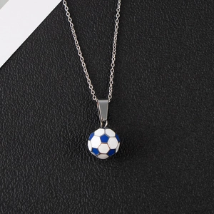 Detailed macro view of soccer ball pendant with blue and white enamel on steel chain