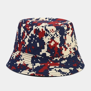Detailed view of the pixelated digital camouflage pattern on a canvas bucket hat