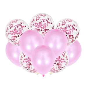 Detail of pink latex balloons and transparent balloons with shimmering pink confetti