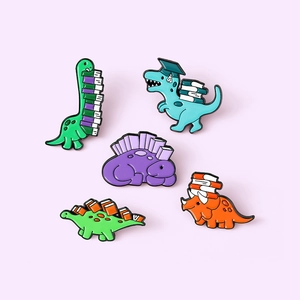 Five cute colorful cartoon dinosaur enamel pins with books and graduation caps for backpacks