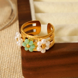 Bohemian adjustable golden stainless steel ring with white and green beaded flowers