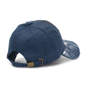 Navy blue distressed NYC baseball cap with vintage rips and white paint splash details
