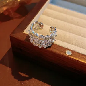 Lace hollow zircon open ring with silver and gold tones in a vintage luxury style