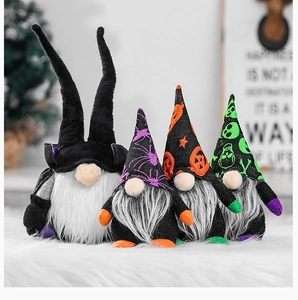 Detailed close-up of 4-piece Halloween faceless gnome plush dolls set with spider and pumpkin
