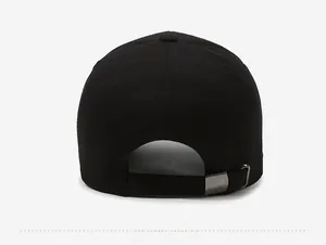 Detail view of black cotton baseball cap back with adjustable metal buckle and stitching