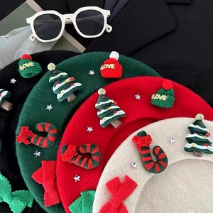 Christmas wool berets in red, green, black and beige with festive bows and tree decor