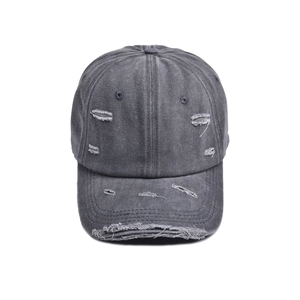 Detail of distressed dark grey cotton baseball cap with vintage frayed brim effects
