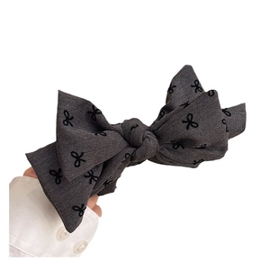 Elegant dark grey double-layered bow hair clip with black butterfly embroidery pattern
