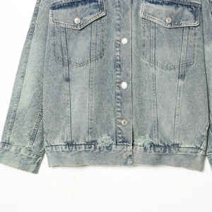 Women's oversized light blue denim jacket with distressed details and metal buttons