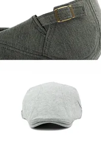 Detailed view of knitted cotton beret with adjustable metal buckle and woven texture