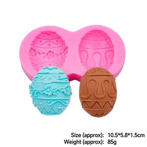 Pink silicone Easter egg mold with embossed textures for chocolate and fondant baking