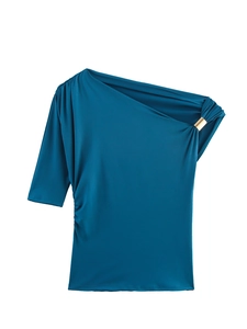Detail of teal blue one-shoulder top featuring pleated design and gold metal buckle ring