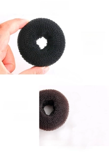 Macro detail of soft nylon donut hair bun maker showing breathable mesh texture