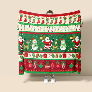 Festive Christmas flannel blanket featuring Santa and snowman patterns in a full layout