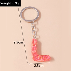 Pink glitter resin letter L keychain with silver ring and precise size measurements