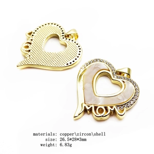 Detailed front and back view of gold MOM heart pendant with shell and cubic zirconia
