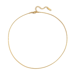 Detail of minimalist gold chain necklace with lobster clasp and adjustable extension chain