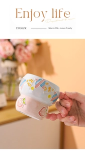 Close-up of hand-painted relief ceramic mug featuring 3D peach and star patterns