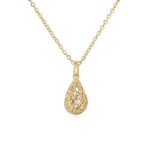 Close-up of a gold water-drop pendant with hollow filigree and sparkling zircon stones