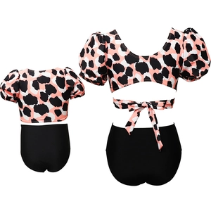 Matching mother daughter two-piece bikini set with puff sleeves and animal print