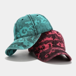 Vintage camouflage baseball cap in washed mint and rose colors for outdoor sun protection