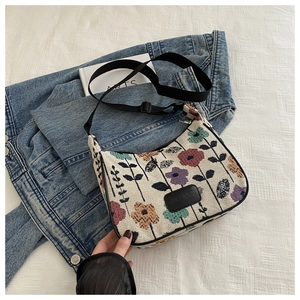 Detailed close-up of floral linen tote with vintage tapestry fabric and nylon strap