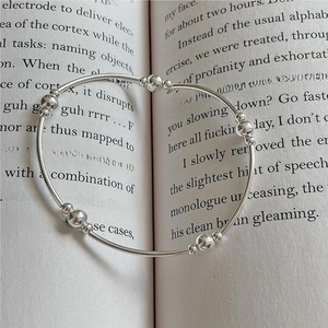 S925 sterling silver beaded bracelet with minimalist elastic geometric design on book