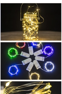 Close-up of flexible LED copper wire string lights with colorful options and battery box