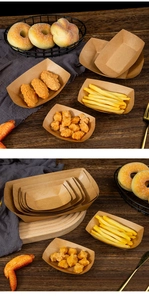 Detail of brown kraft paper boat trays holding fried chicken and crispy French fries