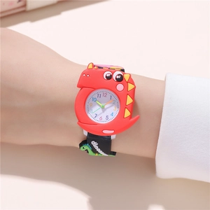 Close-up of red dinosaur cartoon watch with black silicone strap and colorful dial