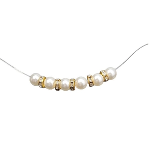 Elastic beaded bracelet with white pearls and gold rhinestone spacer beads on white background