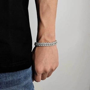 Men's 10mm S925 sterling silver iced-out Moissanite Cuban link bubble bracelet on wrist