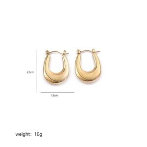 Detailed view of minimalist gold U-shape earrings showing 2.6cm height and 1.8cm width